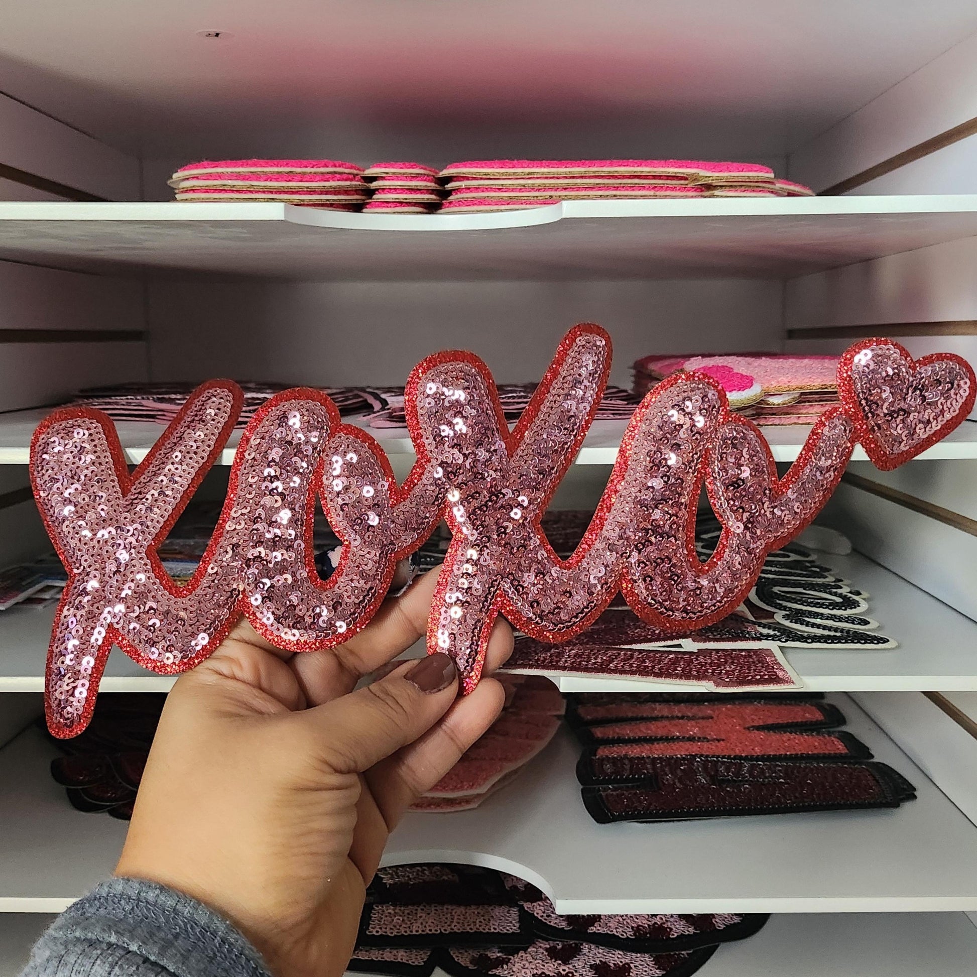 Valentines Full Size Chenille|Sequin| Iron On|Embroidered|Chenille Patches| Chenille Patches| Chenille Patch Sweater| Chenille Patch Iron On

May include: A pink and red sequin applique that says &#39;xoxo&#39; with a heart shape at the end of the &#39;o&#39;.